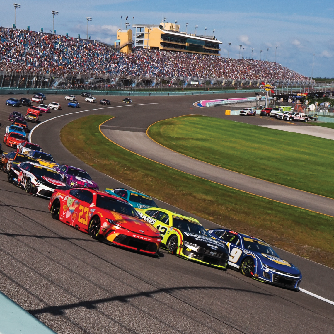 Race Cars on oval track