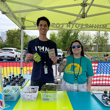 Two Lottery Employees working event