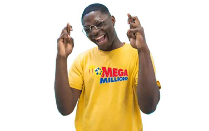 A person in a yellow Mega Millions shirt smiles with fingers crossed, excited about Minnesota Lottery's scratch-offs, lotto games, and second chances.