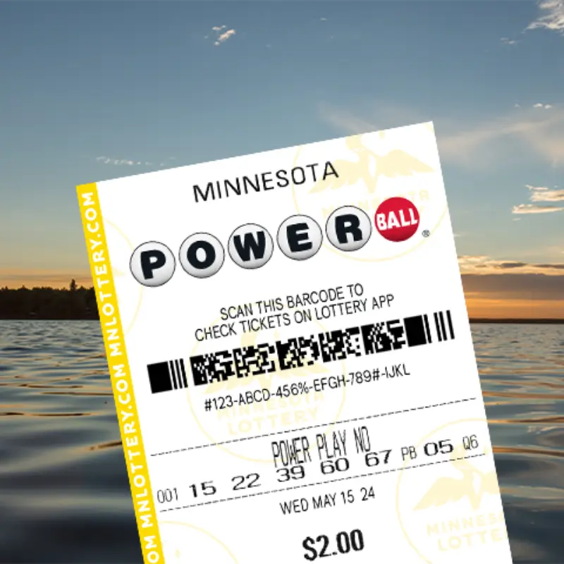 A Minnesota Powerball ticket held before a serene lake at sunset, showing details, barcode, and bold MINNESOTA POWERBALL text.