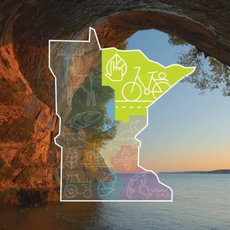 Minnesota outline with biking, camping, and nature icons on a scenic lake sunset with rocky archway in the background.