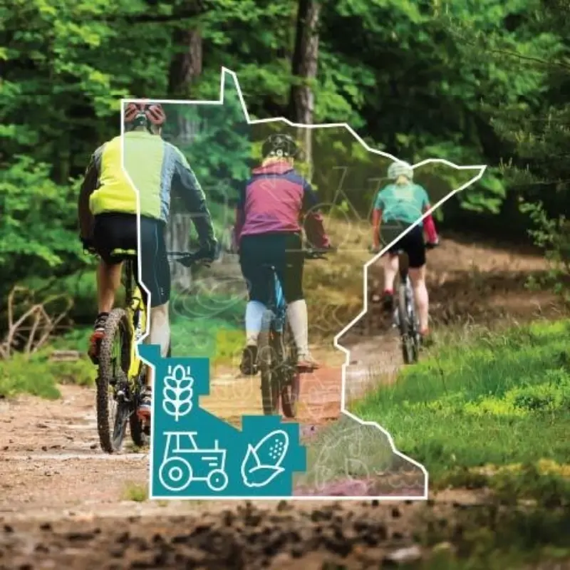 Three cyclists on a forest trail with Minnesota’s outline overlaid and agriculture icons—wheat, tractor, corn, barn—at the bottom.