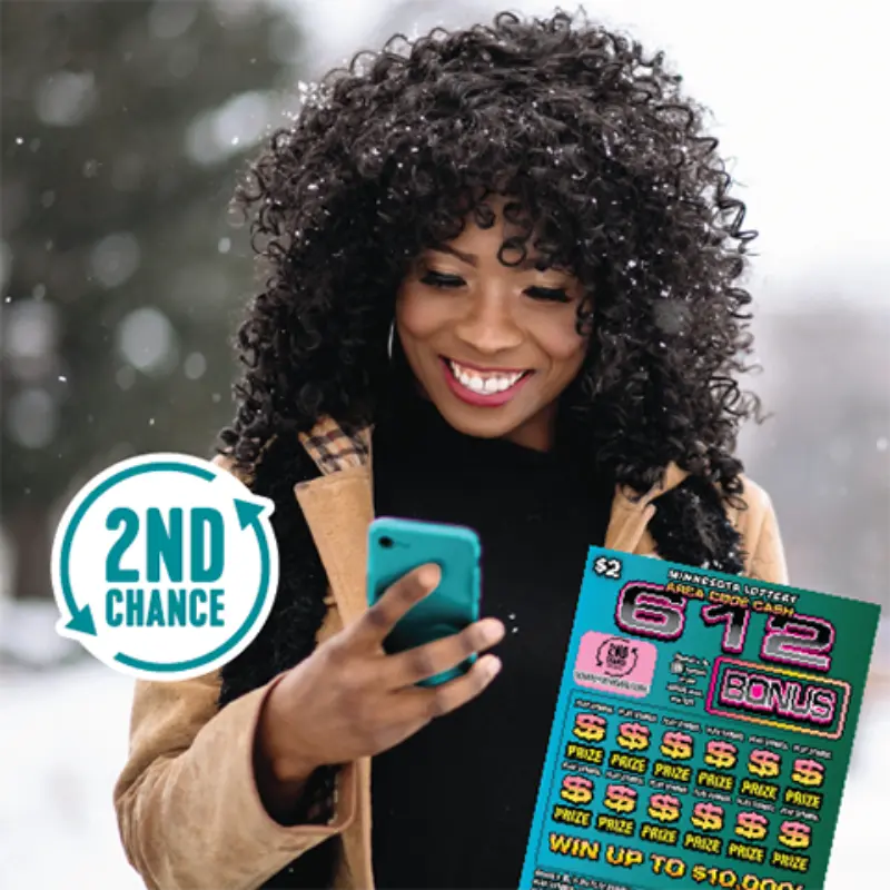 Smiling woman checks her phone outdoors in winter; foreground shows 2nd Chance icon and Minnesota Lottery scratch card.