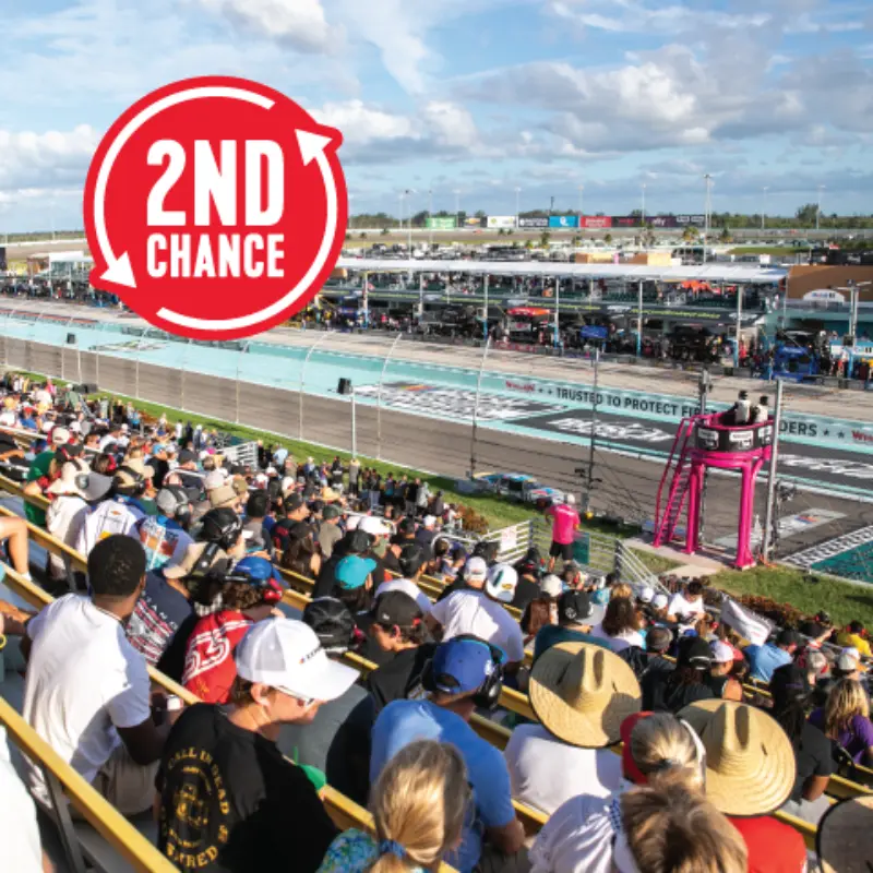 A crowd in grandstands watches a sunny racetrack. Above, a red 2nd Chance graphic with white text and arrows is displayed.