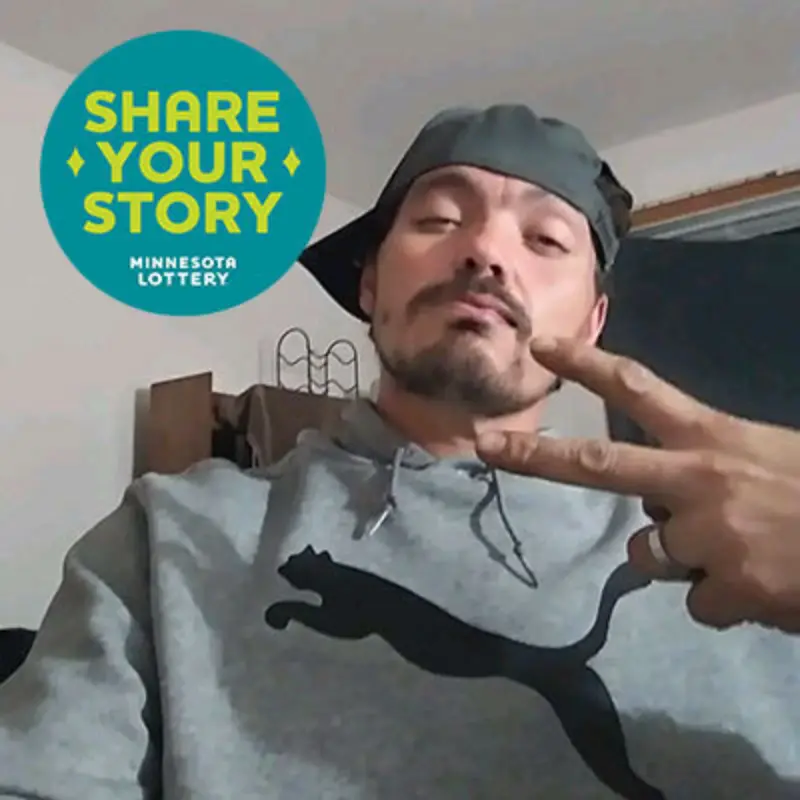 Person in a gray hoodie and backward cap flashes a peace sign. Teal circle reads "Share Your Story, Minnesota Lottery.